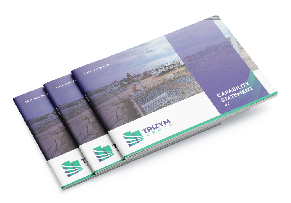 Stacked brochures of Trizym Group, featuring a cover with a construction site image and the title "Capability Statement 2023." The trizymgroup.com website is noted at the top left.